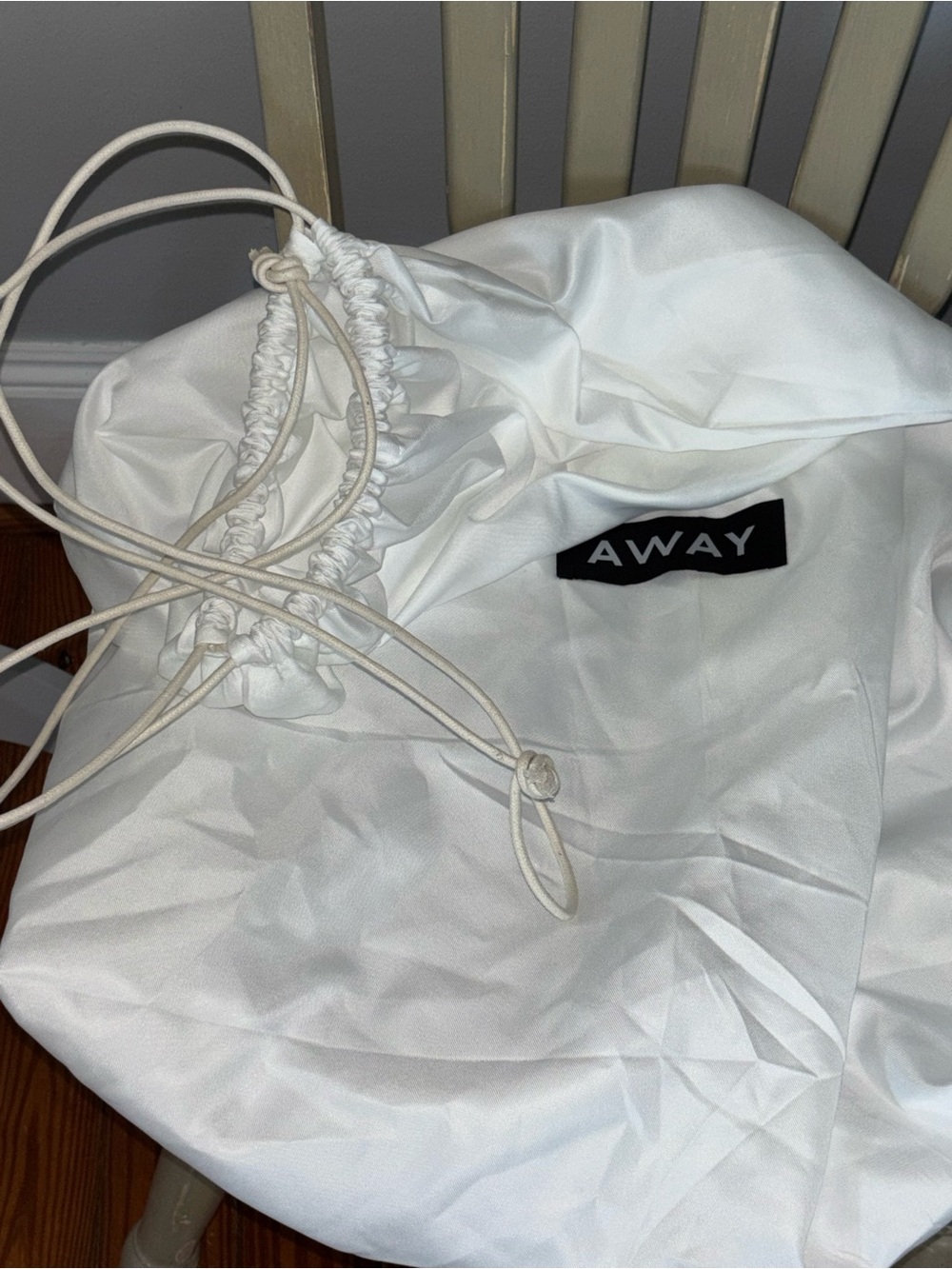 Away White Drawstring Travel Laundry Sack with Black Logo
